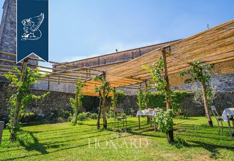 A few steps away from Camaiore, in the province of Lucca, this prestigious, finely-renovated estate is for sale among the walls of a 13th-century convent, currently home to a hospitality business. This estate is perfect for discovering the beauties o...