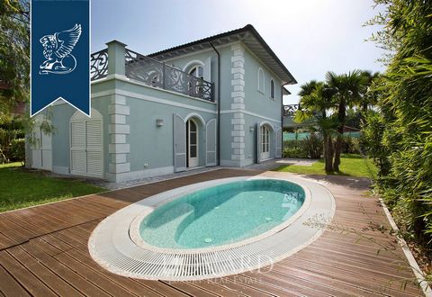 This magnificent villa for sale, in a splendid residential area of Forte dei Marmi, just one kilometer from the sea, was newly built in Liberty style, typical of Versilia, and houses large and bright rooms overlooking a garden of 550 sq m with refine...