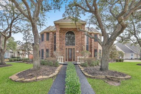 Rare find! Exquisite estate in small gated community! Great living spaces including both formals, gorgeous entry, chandeliers throughout, wet bar with mini fridge, family room with fireplace, marble floors & 18 karat gold accents. Open kitchen with i...