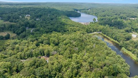 Lifetime opportunity to create your own private dream estate on 13 magnificent waterfront acres with gorgeous views. Property includes a variety of flat, wooded and open land with stone walls. A rare country setting on a very large property with clos...