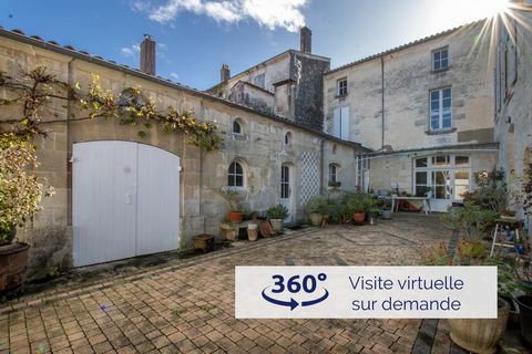 In the heart of Saintonge, on the banks of the Charente, I invite you to go back in time and discover a magnificent property, built in the village of the tourist village of Saint-Savinien, labelled 