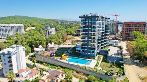 ALANYA/AVSALLAR A 900 METROS DO MAR COM VISTA PARA O MAR 1+1,58 m2,Jardim Piscina interior e exterior Banho Turco e Sauna Jacuzzi - Banho Turco Fitness - Cinema Tênis-Basquetebol- Quadras Parque Infantil & Pérgola Gerador- Wi-Fi Câmera - atendente 24...