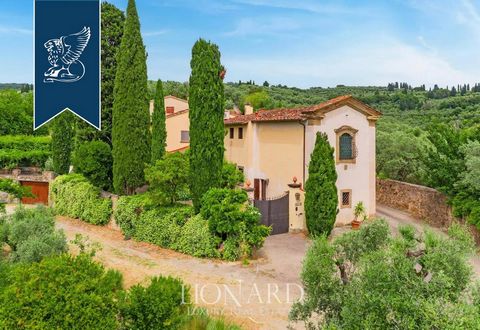 This luxurious property for sale in Florence is set in a panoramic location amidst the lush Tuscan countryside. The estate spans 550 sqm and features 6 bedrooms and 8 bathrooms. Surrounded by a 1.4-hectare park, including a well-maintained olive grov...