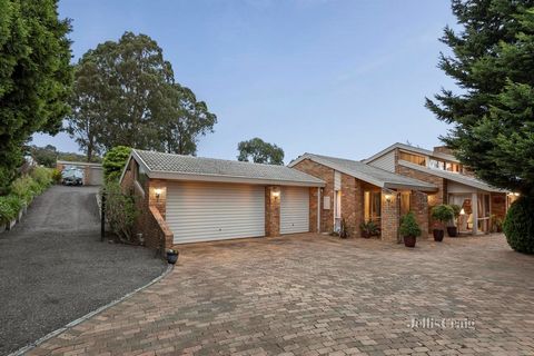 Privately placed in a top of cul de sac position, this Lucas Morris architect designed home delivers uncompromised quality and sun streamed space. The manicured acre encompasses cottage gardens, expansive lawn and ample pockets for children to explor...