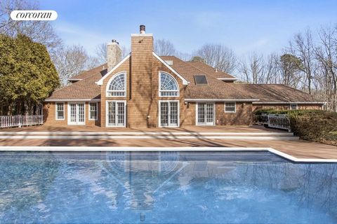 This stunning home in Quogue features a heated pool and tennis court, beautifully decorated by professionals. It is an immaculate, light-filled, and spacious residence with an intelligent floor plan. The first floor boasts an open living room with hi...