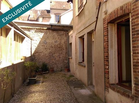 Immeuble de 3 appartements et un local commercial