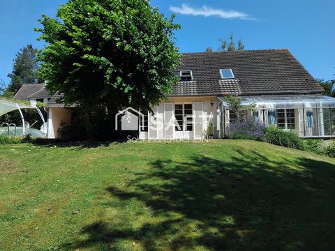 Grande maison familiale avec piscine et jardin arboré
