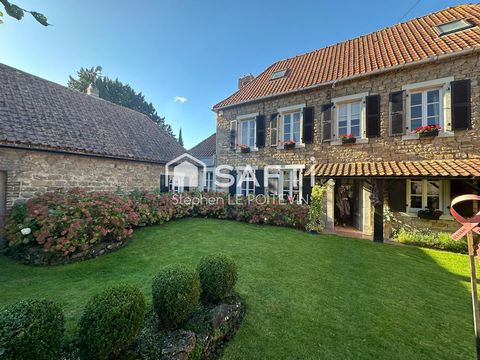 Maison classée en pierre avec jardin arboré