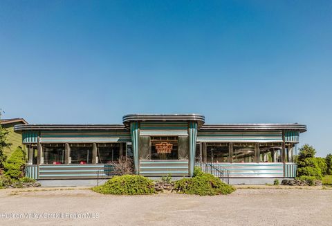 Welcome to the Elizaville Diner & Deli, a Hudson Valley roadside treasure with a lakeside backdrop. Set on just over two picturesque acres, this mixed-use commercial property includes a restored vintage diner, a renovated deli, ample parking, and gra...