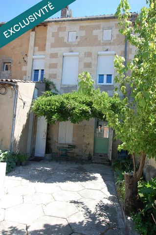 Immeuble rénové avec local commercial et appartements