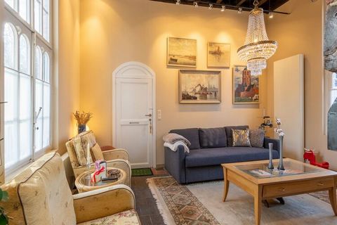 This characteristic apartment with numerous authentic elements has a fantastic appearance. You have a furnished, fenced private garden. This is an excellent choice for an unforgettable holiday with your partner or family. The nice location of this ap...