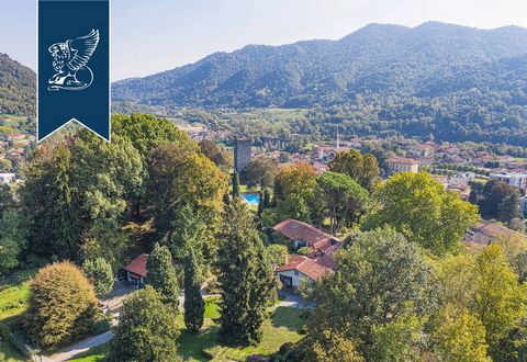 This prestigious property with a 3-hectare park and a big pool is for sale in the heart of an old hamlet in the province of Bergamo, near Lecco, Como and Milan. This splendid villa was designed by one of the most famous architects, Mr Fois, in the 19...