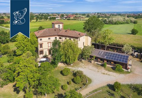 This luxurious 1,000-sqm property for sale in the Monferrato area is an agritourism resort with a riding ring, born from the prestigious walls of a 17th-century castle. Its large park offers a perfectly manicured hectare of lawn, with numerous facili...