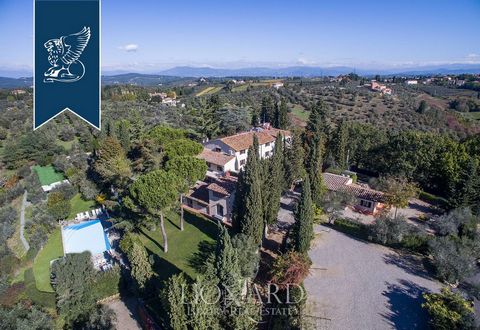 This property for sale is located in a panoramic position on the Chianti hills in Tuscany.This estate is currently home to a luxury tourist accommodation facility. The property's total surface area is of 1,200m2 and includes two multi-storey bui...