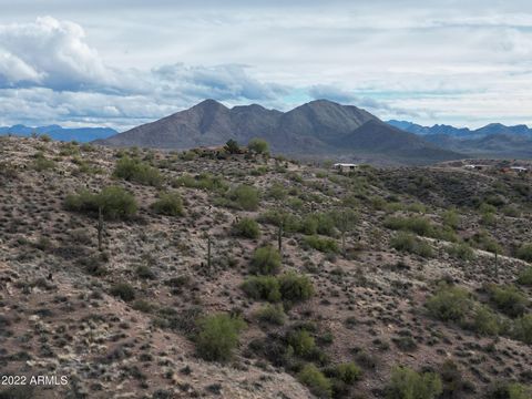 Premium 5 acre Hillside parcel with GORGEOUS MOUNTAIN VIEWS in the Equestrian community of Goldfield Ranch!!! Endless potential to build a custom dream home or horse property in the beautiful Sonoran Desert. Enjoy peace and tranquility but also a sho...