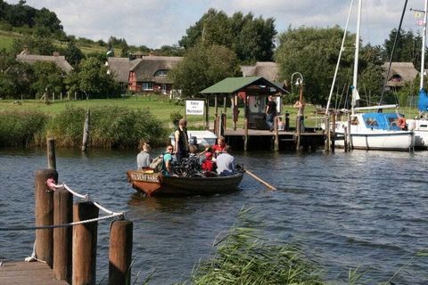 Gezellig 2-kamer vakantieappartement met tuintafel en sprookjesachtig uitzicht op het water, sauna, gratis WiFi