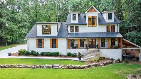 Experience luxury living at its finest in this exquisite 6-bed, 6.5-bath estate located in the most desirable neighborhood in Atlanta, a diamond in the heart of Vinings. Completely Renovated from the ground up, this brand new construction features an...