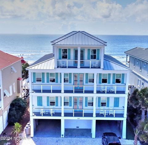 Welcome to this spectacular oceanfront home located on the serene west end of Ocean Isle Beach. This three-level coastal retreat equipped with an elevator and sold furnished is a perfect blend of luxury and comfort, offering breathtaking ocean views ...