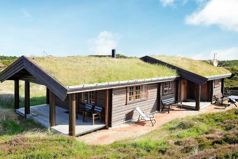 This allergy friendly holiday cottage is located between large heather clad dunes in the very attractive holiday home area of Grærup Beach. There is a stunning view of the magnificent nature from the house. One of the West coast of Jutland’s best bea...