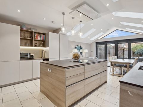 This wonderful family home offers superb living and entertaining space, nowhere is this more apparent than the large kitchen-dining/family room which flows out to the garden via bi-fold doors. The kitchen has been beautifully extended and doesn't tak...