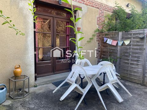 Maison mitoyenne avec jardinet