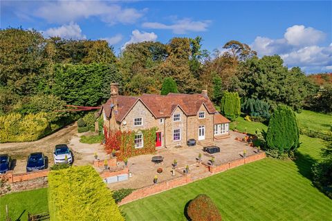 An impressive country house with five/six bedrooms, generous living accommodation, a one bedroom cottage, 3.5 acres of grounds, all standing in an elevated position within the South Shropshire Hills, a designated area of outstanding natural beauty, a...