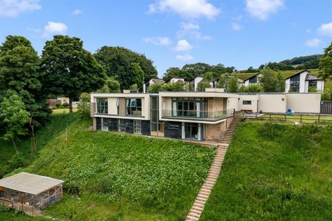 The opportunity to own a home like Ivory House is a very rare one indeed. Built into a tranquil hillside with uninterrupted views across the Turton countryside, this award-winning property is a modern architectural masterpiece, offering not only a st...