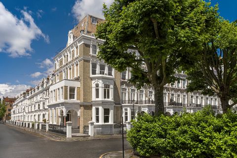 The first thing you will notice about this elegant two-bedroom apartment is its incredibly light interior. Positioned at the end of the terrace, the flat has both a south-facing reception room that spans the width of the building and a west-facing pr...