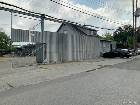 Discover a prime industrial opportunity in Elmsford! This 23,720 sq ft facility offers a versatile space perfect for storage, warehousing, and distribution. With high ceilings, ample truck parking (8,950 sq ft), and a 570 sq ft office, it's designed ...