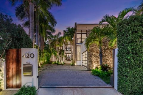 Stunning Venetian Island waterfront home with luxurious finishes. This tropical modern residence showcases a series of architectural scenes with seamless indoor-outdoor living, natural elements & breathtaking wide bay westerly sunsets. Private gated ...