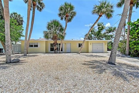 Beaches, Boating & Bistros!!! Excellent Investment, 2nd Home or Build new. Island Style Canal Front Home on Siesta Key, steps to World Famous Siesta Village & the cool quartz sands of Siesta Beach. This Island Style 2 bed, 2 bath home in close proxim...