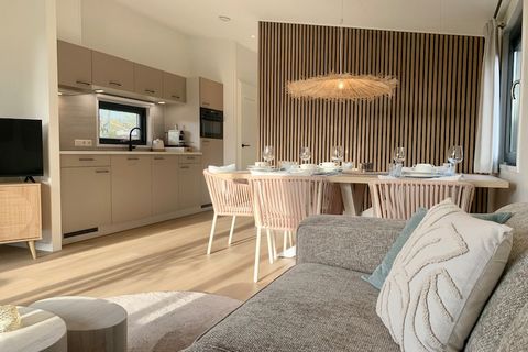 A stylish and newly built chalet, this bright holiday home is designed for up to five guests and features two bedrooms, making it ideal for families or small groups. Completed in June 2024, the chalet offers a modern interior with high ceilings, larg...