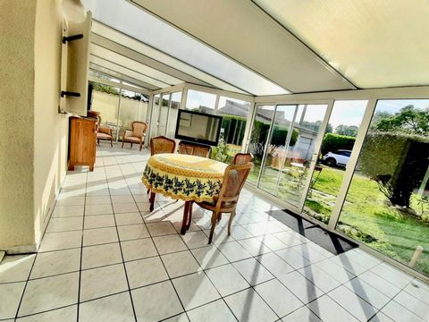 Maison familiale avec véranda, jardin et garage