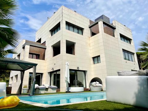 Impressive and unique home built in a contemporary architectural style, located in the exclusive and highly sought-after area of Gava Mar, just south of Barcelona. Located just a few steps from the stunning four kilometre sandy beach and the beautifu...