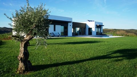 Contemporary luxury villa with stunning views With an open plan main living space with glorious views across the swimming pool and gardens and far reaching views to the coastline & countryside beyond. The kitchen is handmade and has high quality appl...