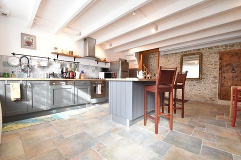 Resting in Saint-Rémy-des-Landes, this is a 4-bedroom holiday home for a family with children or 8 persons. While lying down in the fenced garden or relaxing with a glass of wine, you can admire the peace and nature. Saint-Rémy-des-Landes is a tradit...
