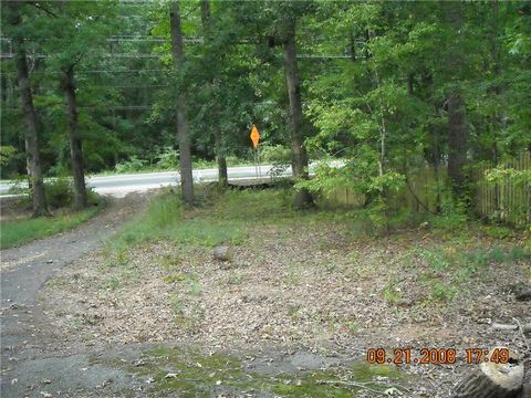 Located in Marietta. HUGE PRICE ADJUSTMENT!! NEW SURVEY, PARCEL is .99 ACRES!! Zoned R-20. Possibly build 2 homes or Room for a larger home with circular drive ?? Mature beautiful trees, Flat lot, Great School District. Convenient to shopping, Dining...