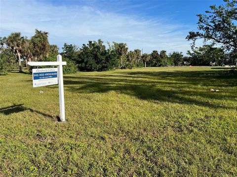 GREAT LOCATION!!! Minutes to Boca Grande and Lemon Bay providing you easy access to beach and boating activities on the Gulf of Mexico—located within a neighborhood of fabulous homes! Are you ready to build your own 
