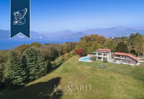 This villa for sale in Laveno Mombello is in an exclusive position in front of Lake Maggiore. It features several levels, measures approximately 1,150 m2 and is composed of 8 bedrooms and 8 bathrooms surrounded by a 3 hectares park. On the ground flo...