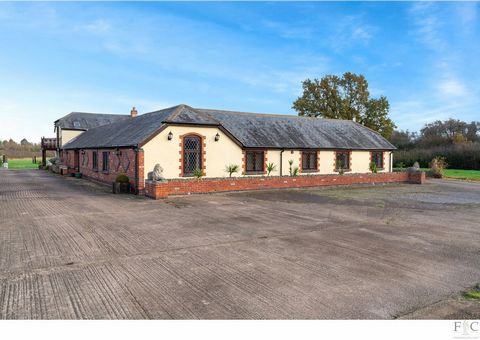 What would you do with a five-bedroom converted farmhouse with an impressive 28 acres of land complete with warehouses and stable complex? Featuring two balcony suites with three additional bathrooms, two kitchens and receptions, an office and study,...