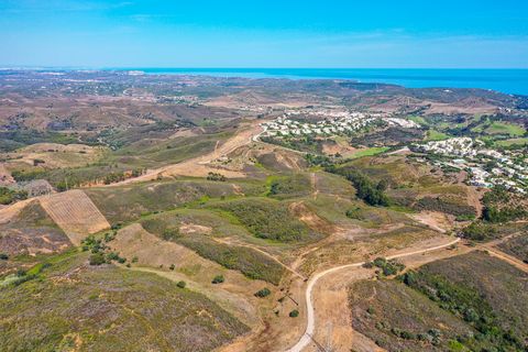 This huge plot of land with more then 48 hectares, is located in the quiet location of Porto Fundo, in Budens. The plot has open views of the countryside, with a mixture of flat and gently sloping areas. The soil is fertile and has many regional tree...