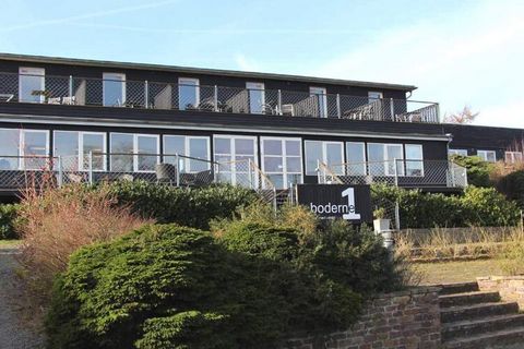 Fantastische Aussicht, das Meer und ein Fischerdorf an der Südküste Bornholms An der Südküste von Bornholm liegt das Fischerdorf Boderne. Der Ferienpark Boderne Nr. 1 bietet bezaubernde Ferienapartments - viele mit Meerblick. Wenn Sie nicht gerade di...