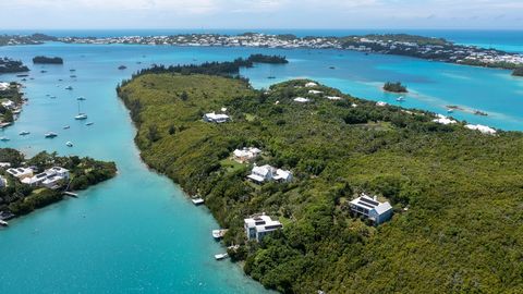 Welcome to Smith's island! The Island lot comes with deeded access; two public docks, island roadways, and option for mooring. 0.45 acres facing southerly with ocean views of Smith's Sound. The lot is ideal for development due to having an elevated p...