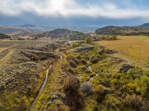 Just South of Lander, Wyoming. The Day Ranch is comprised of 280+/- acres along with a BLM lease for horses/cattle, a 3 bed 2 bath home, shop/barn, loafing sheds, Live Water from Willow Creek and Beason Creek, water rights and so much more! LandLive ...