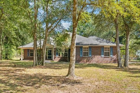 Back on the Market! Beautiful brick custom built home on a private road. This 3 bedroom 2.5 bath home is situated on a private road off of Berryhill road area in Milton. The living kitchen and dining area are open. No carpet in the home! Large 2 car ...