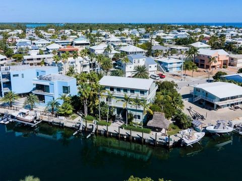 Welcome to your dream waterfront home in the exclusive Port Antigua neighborhood in Islamorada. This stunning 4-bedroom, 3.5-bath home boasts 3,332 square feet of luxurious living space and offers everything you could ever desire. As you step inside,...