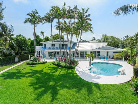 Don't miss out on this rare opportunity to own a truly exceptional waterfront property in one of Miami's most sought-after neighborhoods. This luxurious home boasts 6000+ sqft on a 20,800 sqft corner lot located at the end of Bay Dr. The property fea...