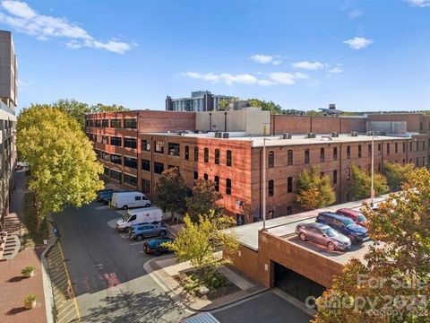Welcome to the epitome of urban living at the Historic Lance Building Factory South, situated in the vibrant heart of South End. Boasting an ideal location, this residence provides swift access to the dynamic energy of Uptown, placing you within walk...