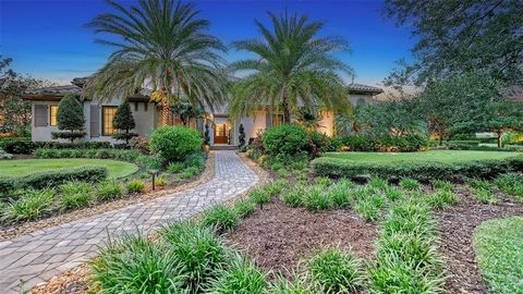 Welcome to this stunning custom-built estate by Anchor Builders, located on a spacious 3/4 acre homesite in the exclusive Concession community. Majestically set among mature, manicured landscaping that overlooks breathtaking views of the picturesque ...