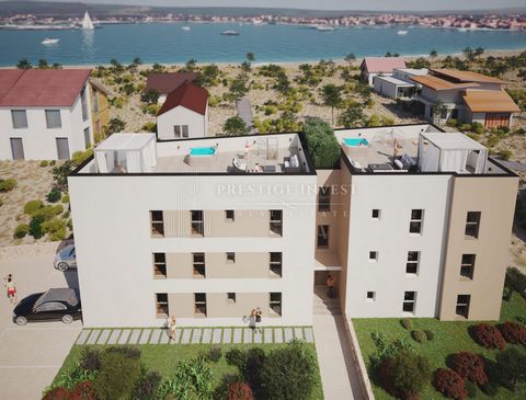 Location: Zadarska županija, Sukošan, Sukošan. An apartment for sale in a small residential building in the CENTER of SUKOŠANA - 30 m away from the beach APARTMENT 2. ( GROUND FLOOR ) consists of: - hallway/hallway (2.10 m2) - living room/kitchen wit...